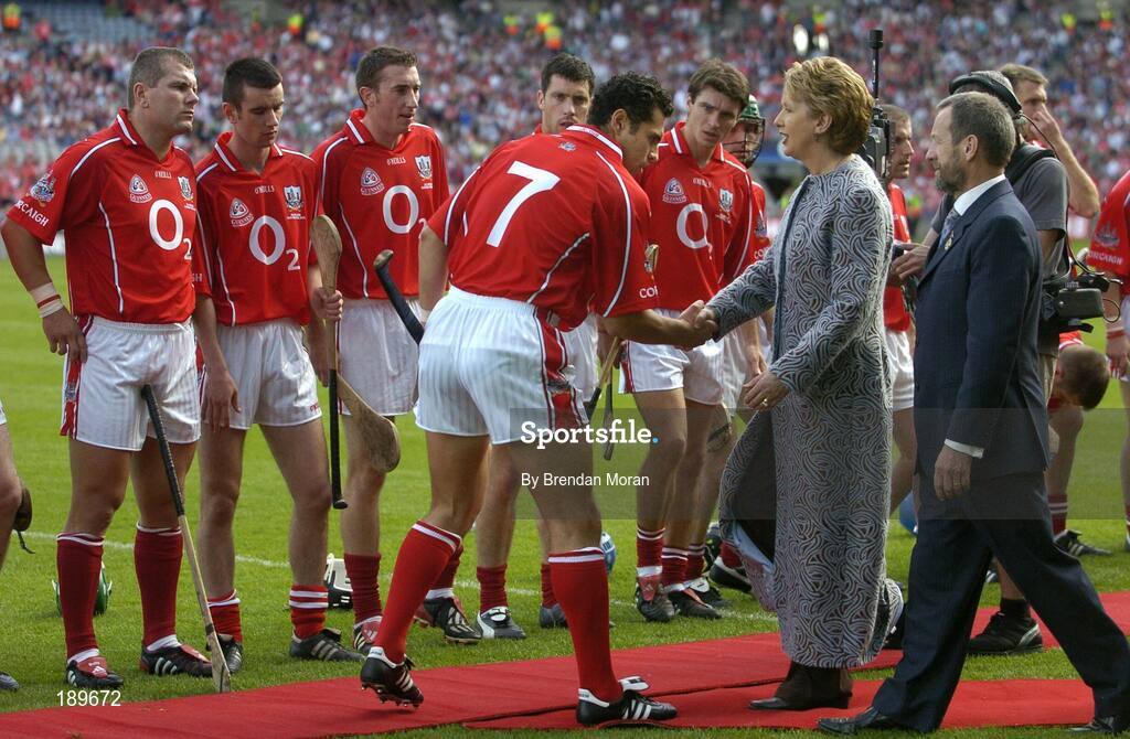 11 September 2005; Cork captain Sean Og O hAilpin greets President Mary McAleese in the presence of GAA President Sean Kelly. Guinness All-Ireland Senior Hurling Championship Final, Galway v Cork, Croke Park, Dublin. Picture credit; Brendan Moran / SPORTSFILE *** Local Caption *** Any photograph taken by SPORTSFILE during, or in connection with, the 2005 Guinness All-Ireland Hurling Final which displays GAA logos or contains an image or part of an image of any GAA intellectual property, or, which contains images of a GAA player/players in their playing uniforms, may only be used for editorial and non-advertising purposes.  Use of photographs for advertising, as posters or for purchase separately is strictly prohibited unless prior written approval has been obtained from the Gaelic Athletic Association.