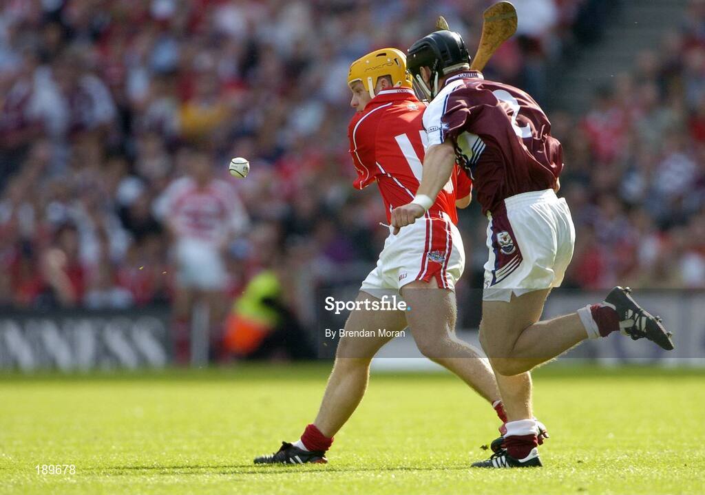 11 September 2005; Joe Deane, Cork, in action against Damien Joyce, Galway. Guinness All-Ireland Senior Hurling Championship Final, Galway v Cork, Croke Park, Dublin. Picture credit; Brendan Moran / SPORTSFILE *** Local Caption *** Any photograph taken by SPORTSFILE during, or in connection with, the 2005 Guinness All-Ireland Hurling Final which displays GAA logos or contains an image or part of an image of any GAA intellectual property, or, which contains images of a GAA player/players in their playing uniforms, may only be used for editorial and non-advertising purposes.  Use of photographs for advertising, as posters or for purchase separately is strictly prohibited unless prior written approval has been obtained from the Gaelic Athletic Association.