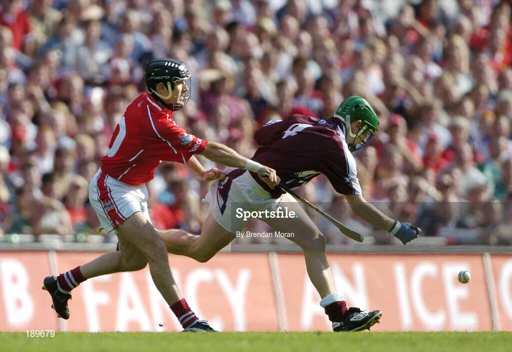 11 September 2005; Ollie Canning, Galway, in action against Ben O'Connor, Cork. Guinness All-Ireland Senior Hurling Championship Final, Galway v Cork, Croke Park, Dublin. Picture credit; Brendan Moran / SPORTSFILE *** Local Caption *** Any photograph taken by SPORTSFILE during, or in connection with, the 2005 Guinness All-Ireland Hurling Final which displays GAA logos or contains an image or part of an image of any GAA intellectual property, or, which contains images of a GAA player/players in their playing uniforms, may only be used for editorial and non-advertising purposes.  Use of photographs for advertising, as posters or for purchase separately is strictly prohibited unless prior written approval has been obtained from the Gaelic Athletic Association.