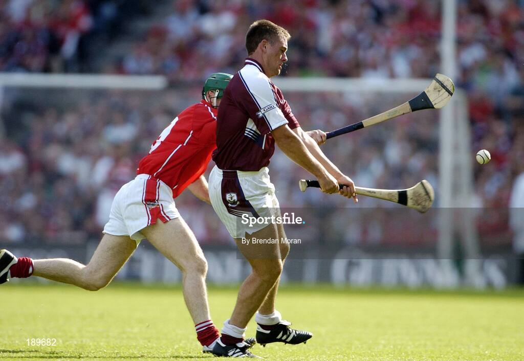 11 September 2005; Derick Hardiman, Galway, in action against Jerry O'Connor, Cork. Guinness All-Ireland Senior Hurling Championship Final, Galway v Cork, Croke Park, Dublin. Picture credit; Brendan Moran / SPORTSFILE *** Local Caption *** Any photograph taken by SPORTSFILE during, or in connection with, the 2005 Guinness All-Ireland Hurling Final which displays GAA logos or contains an image or part of an image of any GAA intellectual property, or, which contains images of a GAA player/players in their playing uniforms, may only be used for editorial and non-advertising purposes.  Use of photographs for advertising, as posters or for purchase separately is strictly prohibited unless prior written approval has been obtained from the Gaelic Athletic Association.