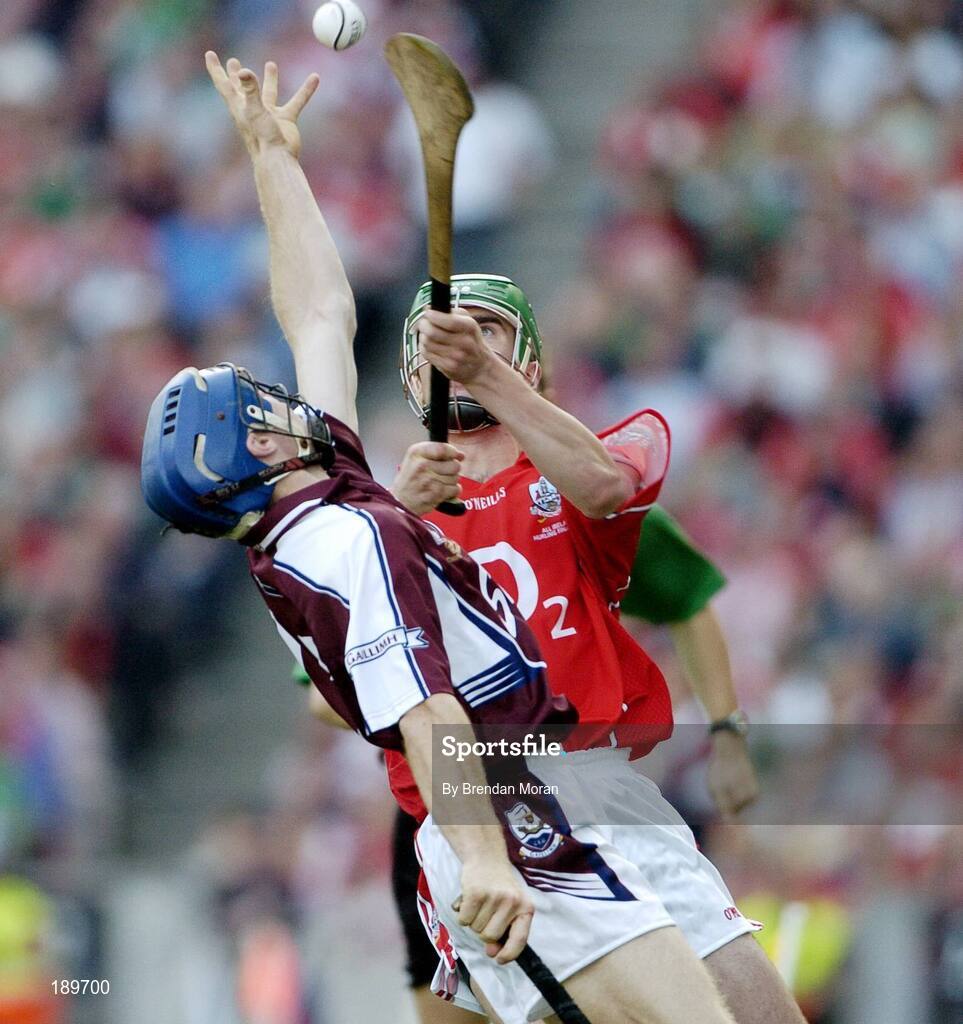 11 September 2005; Damien Hayes, Galway, contests possession with Brian Murphy, Cork. Guinness All-Ireland Senior Hurling Championship Final, Galway v Cork, Croke Park, Dublin. Picture credit; Brendan Moran / SPORTSFILE *** Local Caption *** Any photograph taken by SPORTSFILE during, or in connection with, the 2005 Guinness All-Ireland Hurling Final which displays GAA logos or contains an image or part of an image of any GAA intellectual property, or, which contains images of a GAA player/players in their playing uniforms, may only be used for editorial and non-advertising purposes.  Use of photographs for advertising, as posters or for purchase separately is strictly prohibited unless prior written approval has been obtained from the Gaelic Athletic Association.