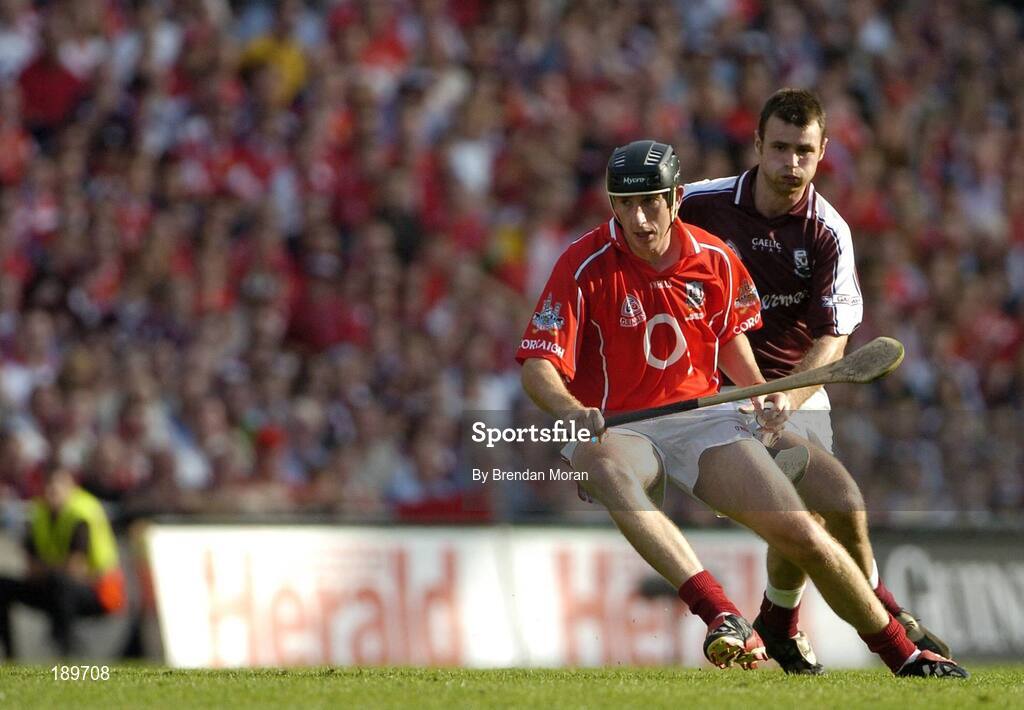 11 September 2005; John Gardiner, Cork, in action against Richie Murray, Galway. Guinness All-Ireland Senior Hurling Championship Final, Galway v Cork, Croke Park, Dublin. Picture credit; Brendan Moran / SPORTSFILE *** Local Caption *** Any photograph taken by SPORTSFILE during, or in connection with, the 2005 Guinness All-Ireland Hurling Final which displays GAA logos or contains an image or part of an image of any GAA intellectual property, or, which contains images of a GAA player/players in their playing uniforms, may only be used for editorial and non-advertising purposes.  Use of photographs for advertising, as posters or for purchase separately is strictly prohibited unless prior written approval has been obtained from the Gaelic Athletic Association.