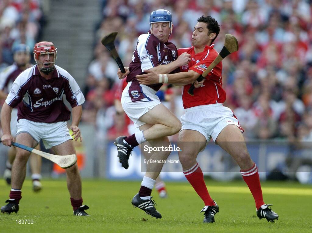 11 September 2005; Kevin Broderick, Galway, in action against Sean Og O hAilpin, Cork. Guinness All-Ireland Senior Hurling Championship Final, Galway v Cork, Croke Park, Dublin. Picture credit; Brendan Moran / SPORTSFILE *** Local Caption *** Any photograph taken by SPORTSFILE during, or in connection with, the 2005 Guinness All-Ireland Hurling Final which displays GAA logos or contains an image or part of an image of any GAA intellectual property, or, which contains images of a GAA player/players in their playing uniforms, may only be used for editorial and non-advertising purposes.  Use of photographs for advertising, as posters or for purchase separately is strictly prohibited unless prior written approval has been obtained from the Gaelic Athletic Association.