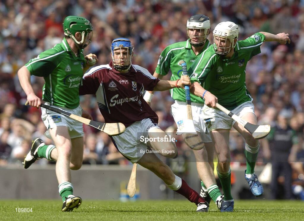 11 September 2005; Conor Kavanagh, Galway, in action against Limerick players from left to right, David Moloney, Liam Hurley and Tom Condon. ESB All-Ireland Minor Hurling Championship Final, Galway v Limerick, Croke Park, Dublin. Picture credit; Damien Eagers / SPORTSFILE