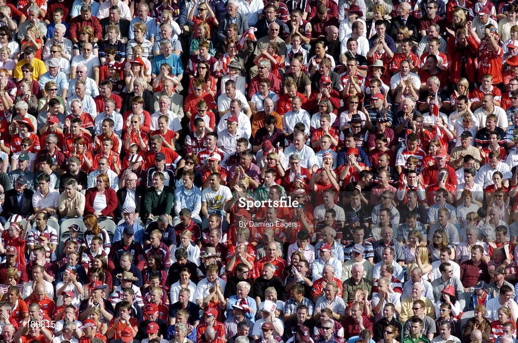 11 September 2005; Galway and Cork supporters watch the match. Guinness All-Ireland Senior Hurling Championship Final, Galway v Cork, Croke Park, Dublin. Picture credit; Damien Eagers / SPORTSFILE *** Local Caption *** Any photograph taken by SPORTSFILE during, or in connection with, the 2005 Guinness All-Ireland Hurling Final which displays GAA logos or contains an image or part of an image of any GAA intellectual property, or, which contains images of a GAA player/players in their playing uniforms, may only be used for editorial and non-advertising purposes.  Use of photographs for advertising, as posters or for purchase separately is strictly prohibited unless prior written approval has been obtained from the Gaelic Athletic Association.
