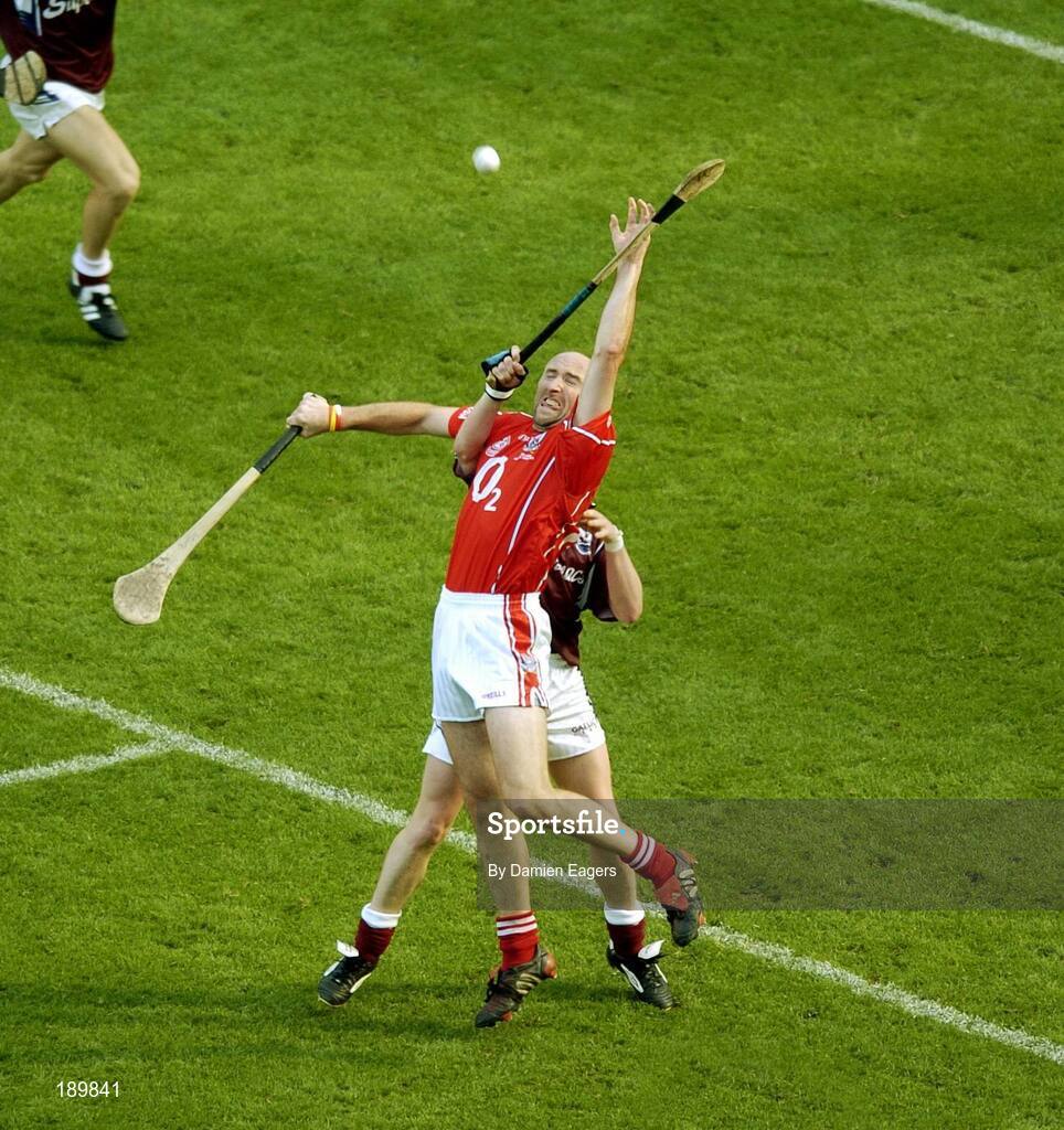 11 September 2005; Brian Corcoran, Cork, in action against Tony Og Regan, Galway. Guinness All-Ireland Senior Hurling Championship Final, Galway v Cork, Croke Park, Dublin. Picture credit; Damien Eagers / SPORTSFILE *** Local Caption *** Any photograph taken by SPORTSFILE during, or in connection with, the 2005 Guinness All-Ireland Hurling Final which displays GAA logos or contains an image or part of an image of any GAA intellectual property, or, which contains images of a GAA player/players in their playing uniforms, may only be used for editorial and non-advertising purposes.  Use of photographs for advertising, as posters or for purchase separately is strictly prohibited unless prior written approval has been obtained from the Gaelic Athletic Association.