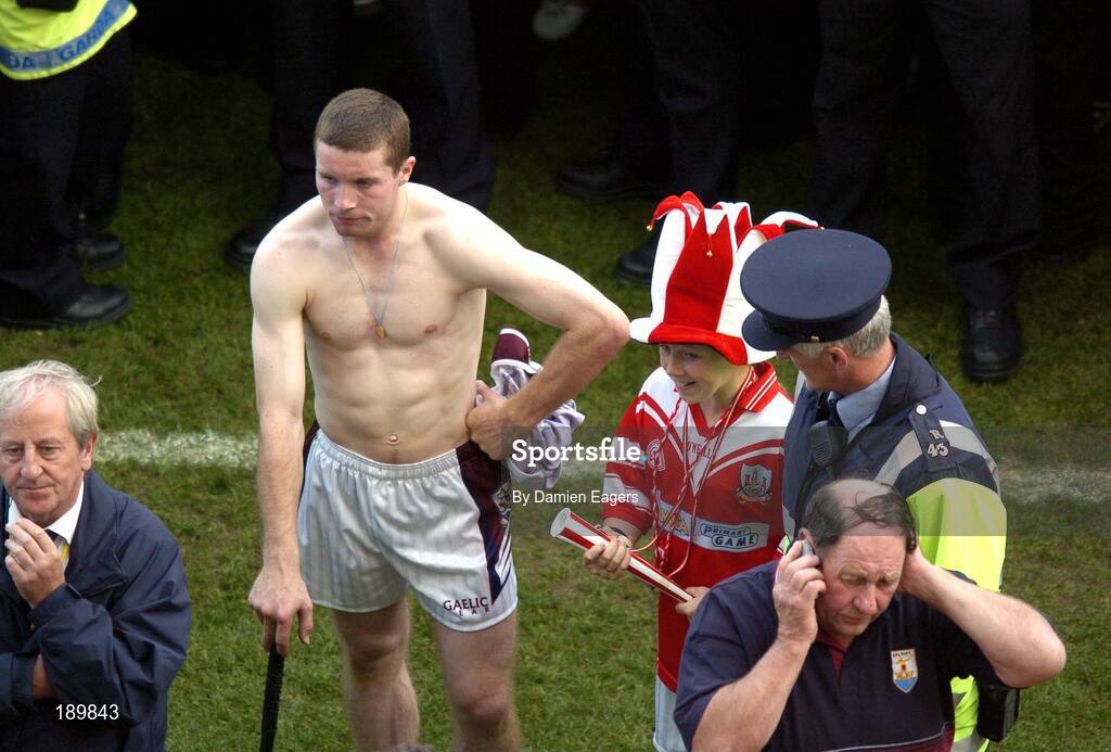 11 September 2005; Galway's Damien Hayes looks on as the Liam MacCarthy cup is presented to Cork. Guinness All-Ireland Senior Hurling Championship Final, Galway v Cork, Croke Park, Dublin. Picture credit; Damien Eagers / SPORTSFILE *** Local Caption *** Any photograph taken by SPORTSFILE during, or in connection with, the 2005 Guinness All-Ireland Hurling Final which displays GAA logos or contains an image or part of an image of any GAA intellectual property, or, which contains images of a GAA player/players in their playing uniforms, may only be used for editorial and non-advertising purposes.  Use of photographs for advertising, as posters or for purchase separately is strictly prohibited unless prior written approval has been obtained from the Gaelic Athletic Association.