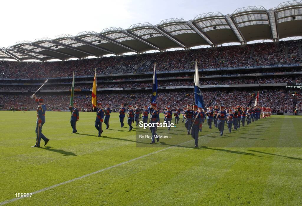 11 September 2005; The Artane Band lead the Cork and Galway teams during the pre-match parade. Guinness All-Ireland Senior Hurling Championship Final, Galway v Cork, Croke Park, Dublin. Picture credit; Ray McManus / SPORTSFILE *** Local Caption *** Any photograph taken by SPORTSFILE during, or in connection with, the 2005 Guinness All-Ireland Hurling Final which displays GAA logos or contains an image or part of an image of any GAA intellectual property, or, which contains images of a GAA player/players in their playing uniforms, may only be used for editorial and non-advertising purposes.  Use of photographs for advertising, as posters or for purchase separately is strictly prohibited unless prior written approval has been obtained from the Gaelic Athletic Association.