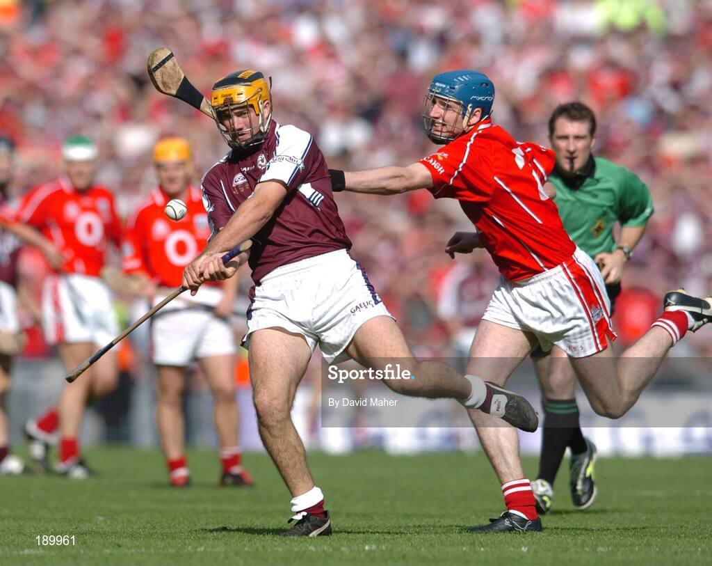 11 September 2005; Ger Farragher, Galway, in action against Pat Mulcahy, Cork. Guinness All-Ireland Senior Hurling Championship Final, Galway v Cork, Croke Park, Dublin. Picture credit; David Maher / SPORTSFILE *** Local Caption *** Any photograph taken by SPORTSFILE during, or in connection with, the 2005 Guinness All-Ireland Hurling Final which displays GAA logos or contains an image or part of an image of any GAA intellectual property, or, which contains images of a GAA player/players in their playing uniforms, may only be used for editorial and non-advertising purposes.  Use of photographs for advertising, as posters or for purchase separately is strictly prohibited unless prior written approval has been obtained from the Gaelic Athletic Association.