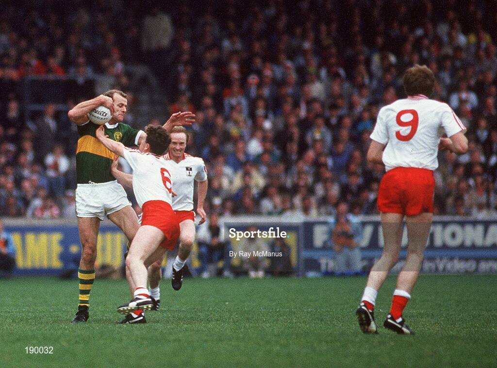 21 September 1986; Jack O'Shea of Kerry is tackled by Noel McGinn of Tyrone during the All-Ireland Senior Football Championship final between Kerry and Tyrone in Croke Park, Dublin. Photo by Ray McManus/Sportsfile