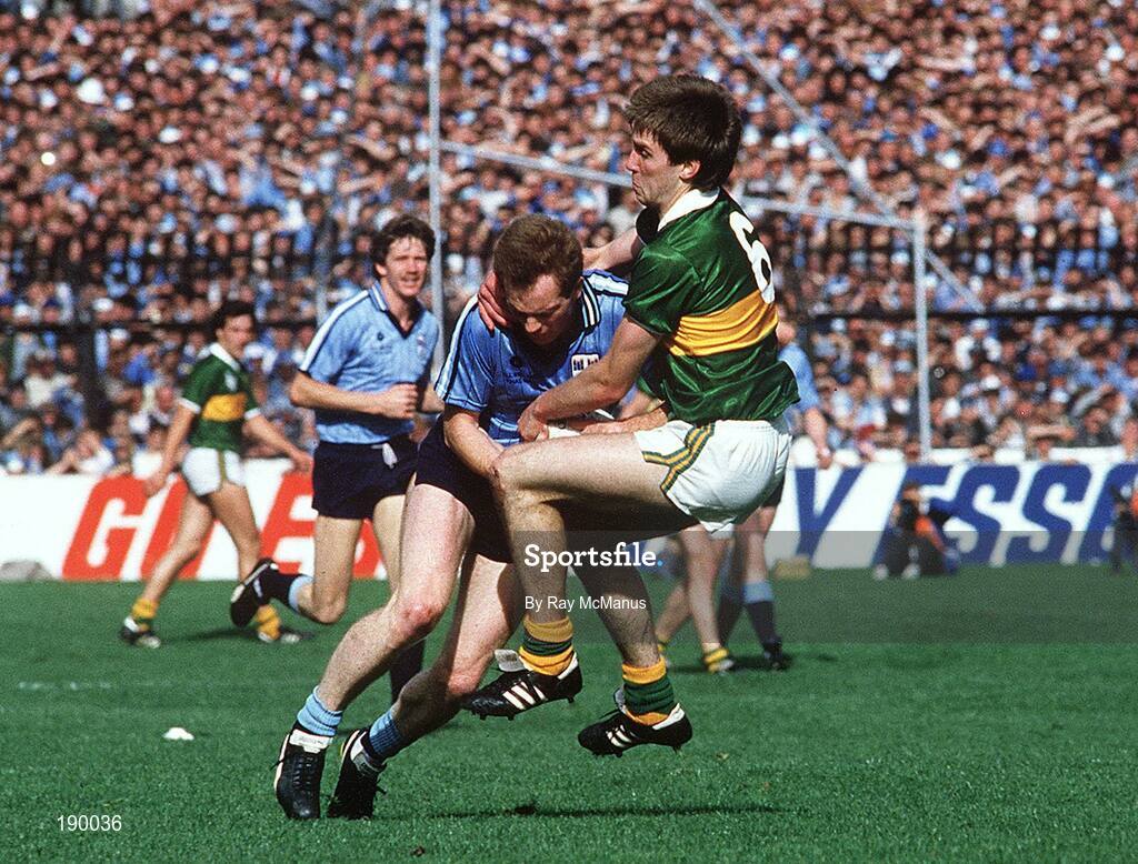 22 September 1985; Tom Spillane of Kerry in action against Barney Rock of Dublin during the All Ireland Football Championship Final match between Kerry and Dublin at Croke Park, Dublin. Photo by Ray McManus/Sportsfile