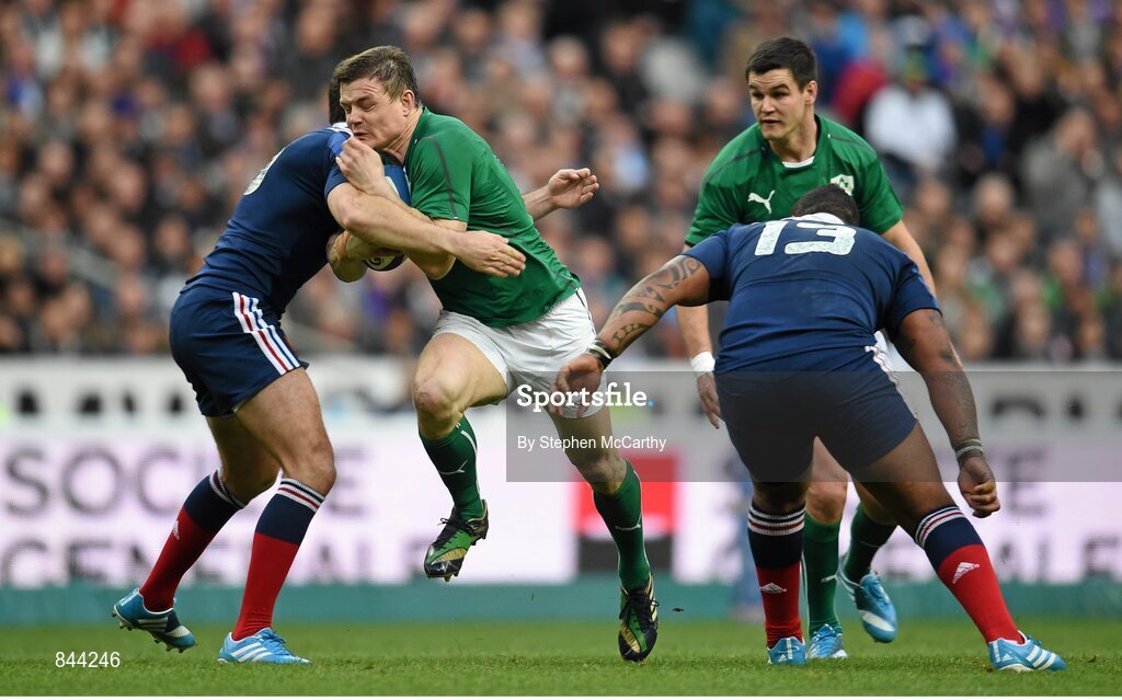 15 March 2014; Brian O'Driscoll, Ireland, is tackled by Remi Tálès, France. RBS Six Nations Rugby Championship 2014, France v Ireland, Stade De France, Saint Denis, Paris, France. Picture credit: Stephen McCarthy / SPORTSFILE