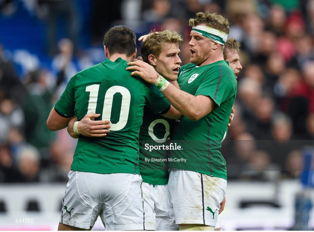 15 March 2014; Andrew Trimble, Ireland, celebrates after scoring his side's second try with team-mates Jonathan Sexton, 10, and Jamie Heaslip, right. RBS Six Nations Rugby Championship 2014, France v Ireland. Stade De France, Saint Denis, Paris, France. Picture credit: Stephen McCarthy / SPORTSFILE