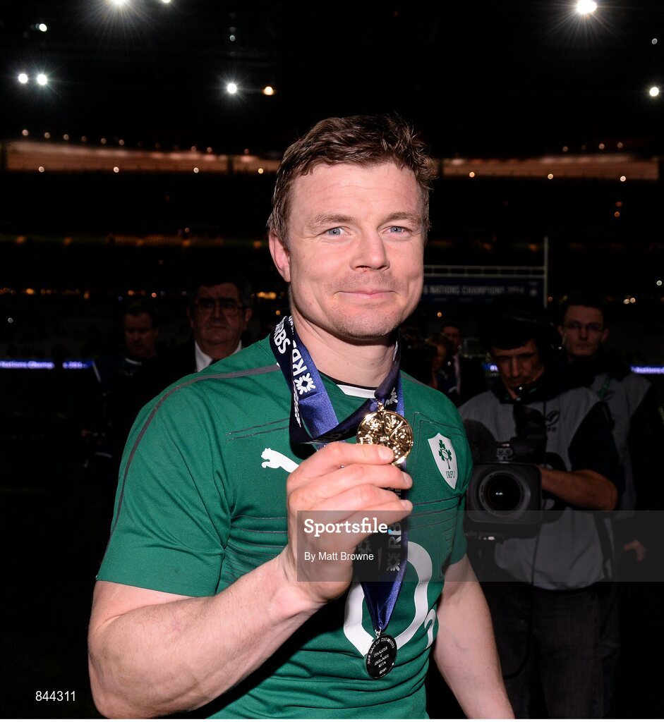 15 March 2014; Brian O'Driscoll, Ireland, shows off his six nations championship medal on the occasion of his final appearance for Ireland. RBS Six Nations Rugby Championship 2014, France v Ireland, Stade De France, Saint Denis, Paris, France. Picture credit: Matt Browne / SPORTSFILE