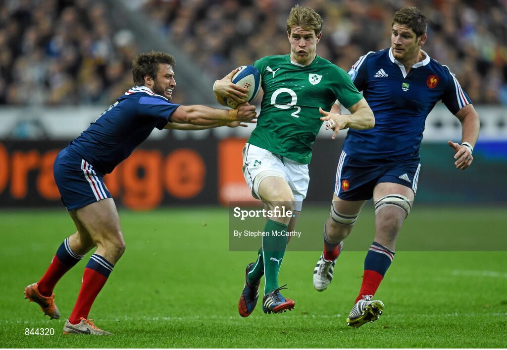 15 March 2014; Andrew Trimble, Ireland, is tackled by Maxime Médard, France. RBS Six Nations Rugby Championship 2014, France v Ireland, Stade De France, Saint Denis, Paris, France. Picture credit: Stephen McCarthy / SPORTSFILE