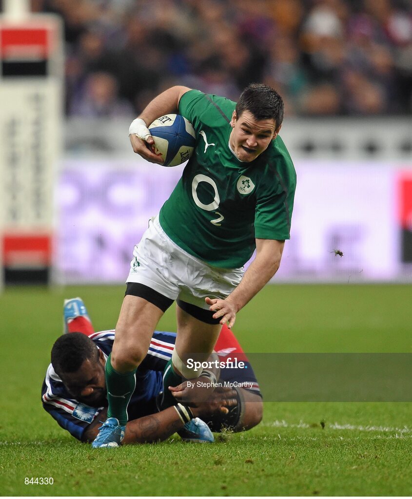 15 March 2014; Jonathan Sexton, Ireland, is tackled by Mathieu Bastareaud, France. RBS Six Nations Rugby Championship 2014, France v Ireland, Stade De France, Saint Denis, Paris, France. Picture credit: Stephen McCarthy / SPORTSFILE