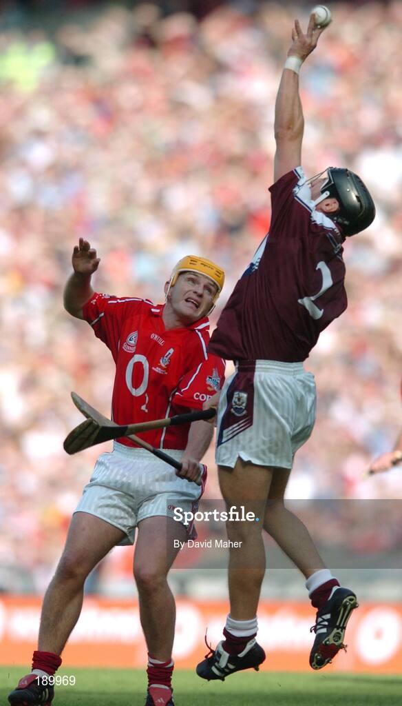 11 September 2005; Joe Deane, Cork, in action against Damien Joyce, Galway. Guinness All-Ireland Senior Hurling Championship Final, Galway v Cork, Croke Park, Dublin. Picture credit; David Maher / SPORTSFILE *** Local Caption *** Any photograph taken by SPORTSFILE during, or in connection with, the 2005 Guinness All-Ireland Hurling Final which displays GAA logos or contains an image or part of an image of any GAA intellectual property, or, which contains images of a GAA player/players in their playing uniforms, may only be used for editorial and non-advertising purposes.  Use of photographs for advertising, as posters or for purchase separately is strictly prohibited unless prior written approval has been obtained from the Gaelic Athletic Association.