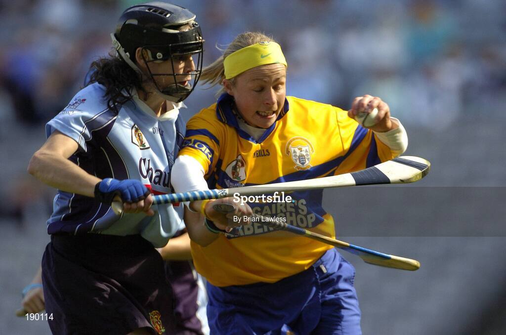 18 September 2005; Rachel Lynch, Clare, in action against Louise O'Hara, Dublin. Dublin v Clare, All-Ireland Junior Camogie Final, Croke Park, Dublin. Picture credit; Brian Lawless / SPORTSFILE *** Local Caption *** Any photograph taken by SPORTSFILE during, or in connection with, the 2005 Guinness All-Ireland Hurling Final which displays GAA logos or contains an image or part of an image of any GAA intellectual property, or, which contains images of a GAA player/players in their playing uniforms, may only be used for editorial and non-advertising purposes.  Use of photographs for advertising, as posters or for purchase separately is strictly prohibited unless prior written approval has been obtained from the Gaelic Athletic Association.