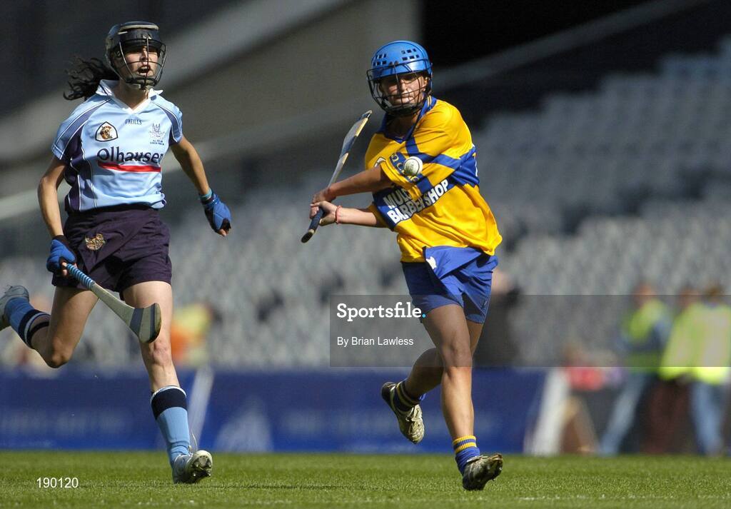 18 September 2005; Laura Linnane, Clare, in action against Louise O'Hara, Dublin. Dublin v Clare, All-Ireland Junior Camogie Final, Croke Park, Dublin. Picture credit; Brian Lawless / SPORTSFILE *** Local Caption *** Any photograph taken by SPORTSFILE during, or in connection with, the 2005 Guinness All-Ireland Hurling Final which displays GAA logos or contains an image or part of an image of any GAA intellectual property, or, which contains images of a GAA player/players in their playing uniforms, may only be used for editorial and non-advertising purposes.  Use of photographs for advertising, as posters or for purchase separately is strictly prohibited unless prior written approval has been obtained from the Gaelic Athletic Association.