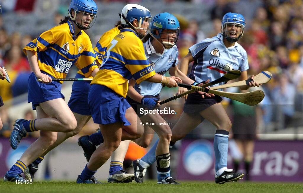 18 September 2005; Andrea Fitzpatrick, Dublin, in action against Claire McMahon, Clare. Dublin v Clare, All-Ireland Junior Camogie Final, Croke Park, Dublin. Picture credit; Brian Lawless / SPORTSFILE *** Local Caption *** Any photograph taken by SPORTSFILE during, or in connection with, the 2005 Guinness All-Ireland Hurling Final which displays GAA logos or contains an image or part of an image of any GAA intellectual property, or, which contains images of a GAA player/players in their playing uniforms, may only be used for editorial and non-advertising purposes.  Use of photographs for advertising, as posters or for purchase separately is strictly prohibited unless prior written approval has been obtained from the Gaelic Athletic Association.