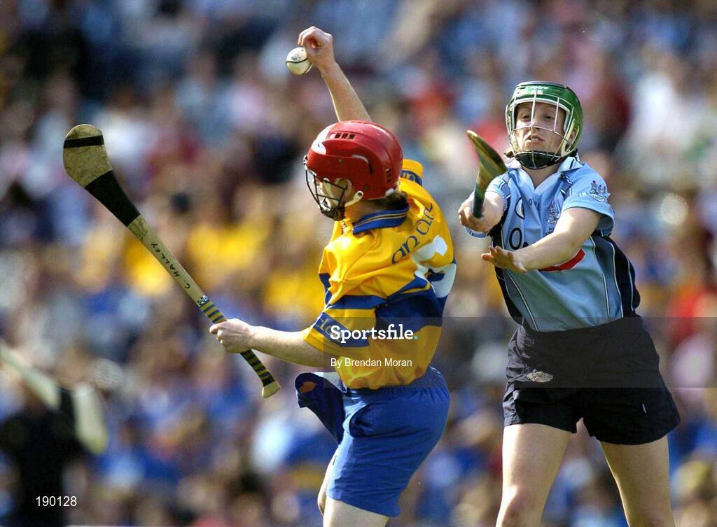 18 September 2005; Cathy Halley, Clare, in action against Gillian McCluskey, Dublin. Dublin v Clare, All-Ireland Junior Camogie Final, Croke Park, Dublin. Picture credit; Brendan Moran / SPORTSFILE *** Local Caption *** Any photograph taken by SPORTSFILE during, or in connection with, the 2005 Guinness All-Ireland Hurling Final which displays GAA logos or contains an image or part of an image of any GAA intellectual property, or, which contains images of a GAA player/players in their playing uniforms, may only be used for editorial and non-advertising purposes.  Use of photographs for advertising, as posters or for purchase separately is strictly prohibited unless prior written approval has been obtained from the Gaelic Athletic Association.