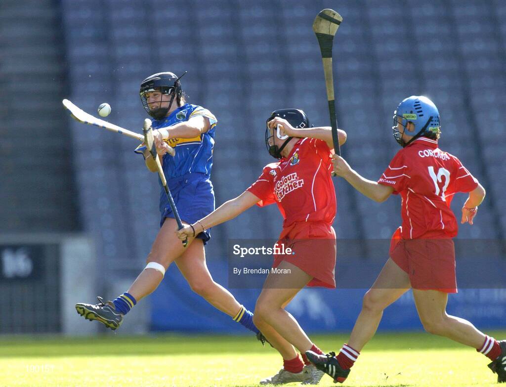 18 September 2005; Ciara Gaynor, Tipperary, is tackled by Gemma O'Connor and Jennifer O'Leary, right, Cork. Tipperary v Cork, Foras na Gaeilge All-Ireland Senior Camogie Final, Croke Park, Dublin. Picture credit; Brendan Moran / SPORTSFILE