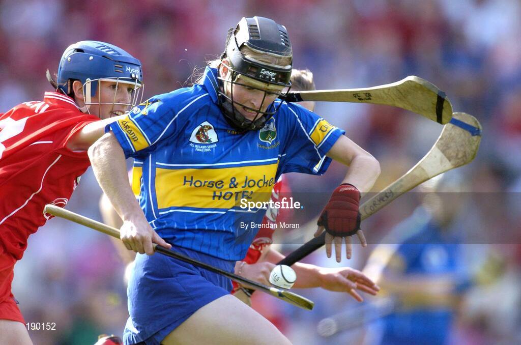 18 September 2005; Joanne Ryan, Tipperary, is tackled by Rosarie Holland, Cork. Tipperary v Cork, Foras na Gaeilge All-Ireland Senior Camogie Final, Croke Park, Dublin. Picture credit; Brendan Moran / SPORTSFILE