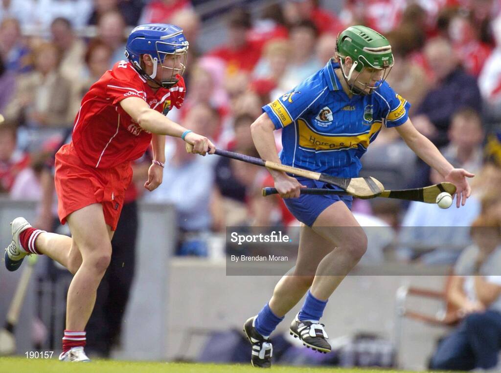 18 September 2005; Eimear McDonnell, Tipperary, is tackled by Rena Buckley, Cork. Tipperary v Cork, Foras na Gaeilge All-Ireland Senior Camogie Final, Croke Park, Dublin. Picture credit; Brendan Moran / SPORTSFILE