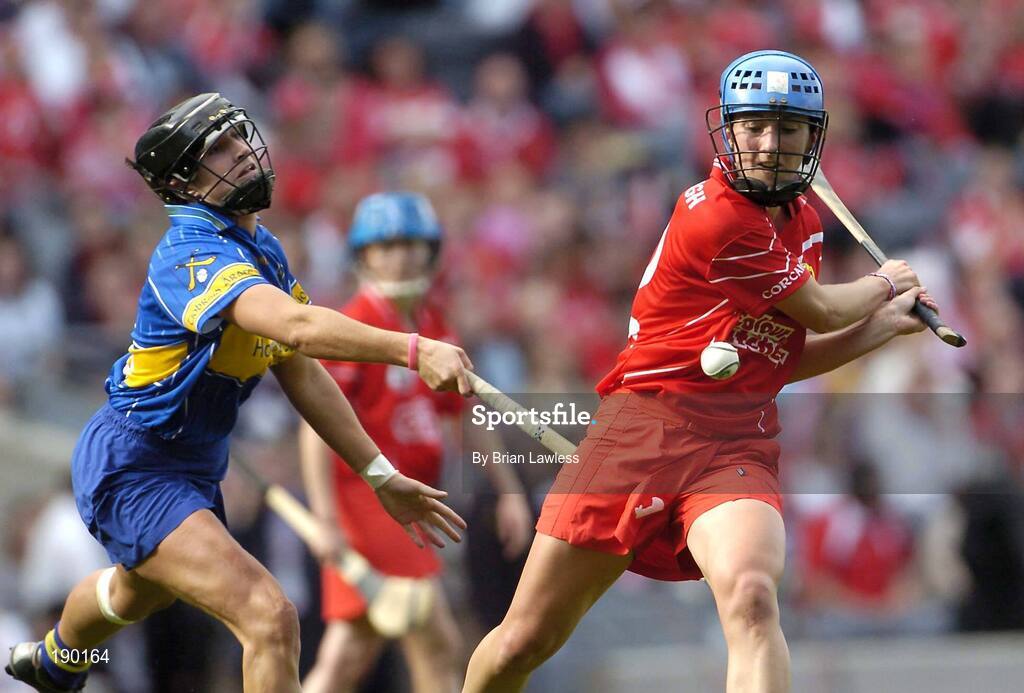 18 September 2005; Jennifer O'Leary, Cork, in action against Ciara Gaynor, Tipperary. Tipperary v Cork, All-Ireland Senior Camogie Final, Croke Park, Dublin. Picture credit; Brian Lawless / SPORTSFILE