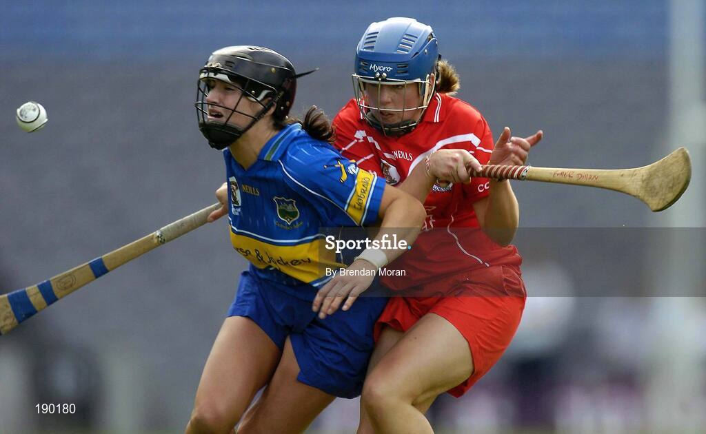 18 September 2005; Ciara Gaynor, Tipperary, is tackled by Emer Dillon, Cork. Tipperary v Cork, Foras na Gaeilge All-Ireland Senior Camogie Final, Croke Park, Dublin. Picture credit; Brendan Moran / SPORTSFILE