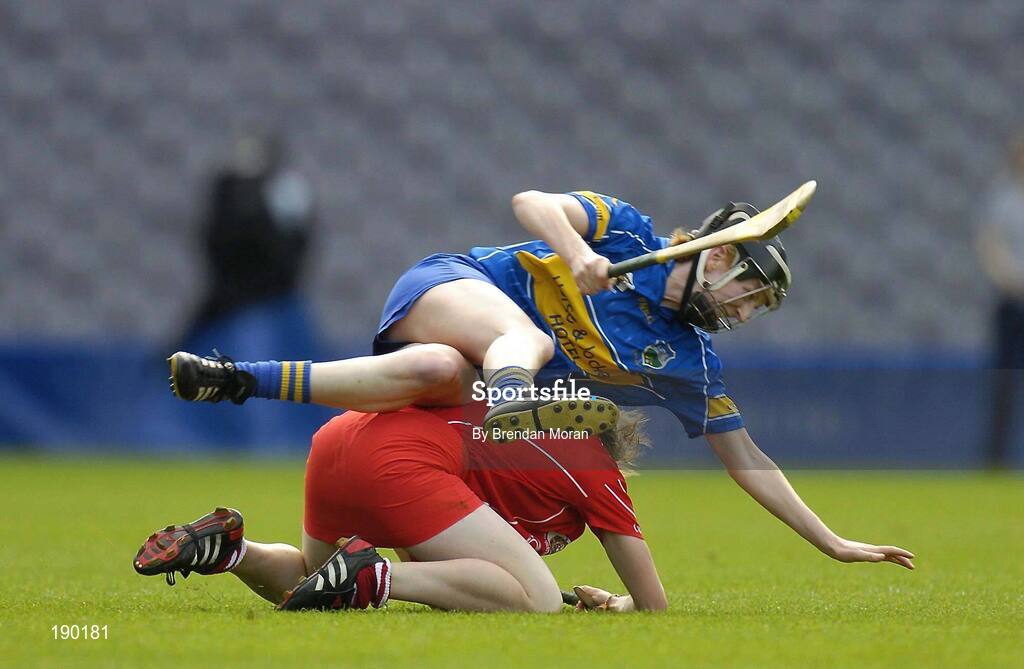 18 September 2005; Therese Brophy, Tipperary, goes over the top of Briege Corkery, Cork. Tipperary v Cork, Foras na Gaeilge All-Ireland Senior Camogie Final, Croke Park, Dublin. Picture credit; Brendan Moran / SPORTSFILE