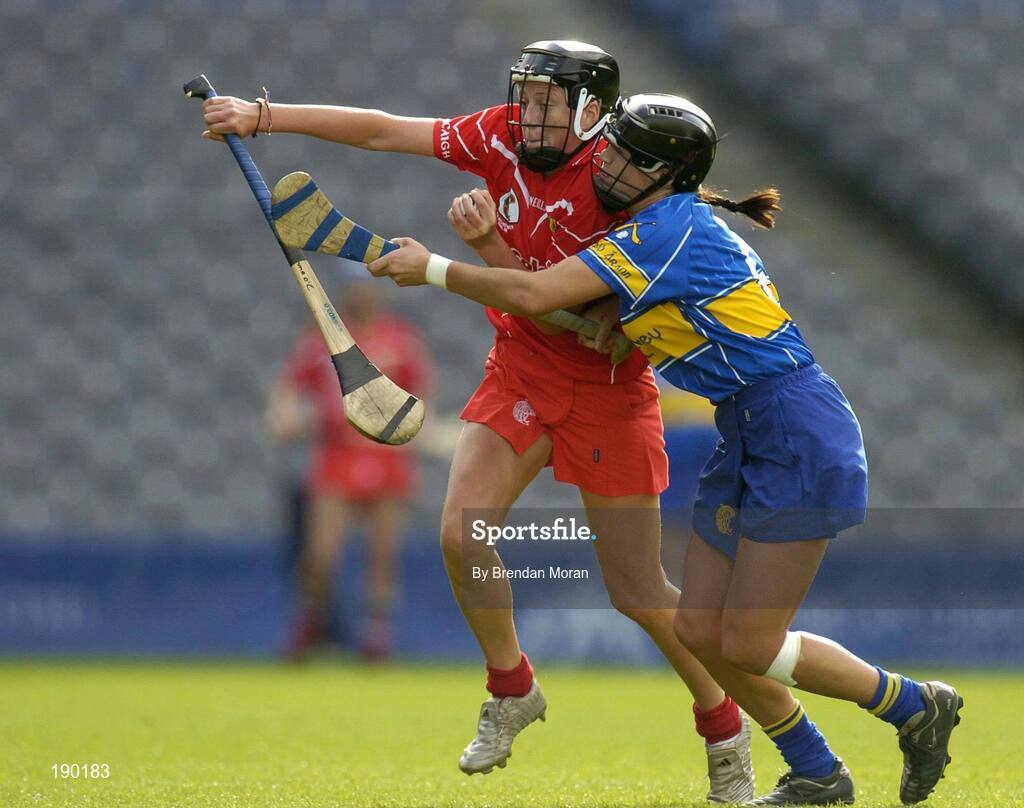18 September 2005; Gemma O'Connor, Cork, is tackled by Ciara Gaynor, Tipperary. Tipperary v Cork, Foras na Gaeilge All-Ireland Senior Camogie Final, Croke Park, Dublin. Picture credit; Brendan Moran / SPORTSFILE