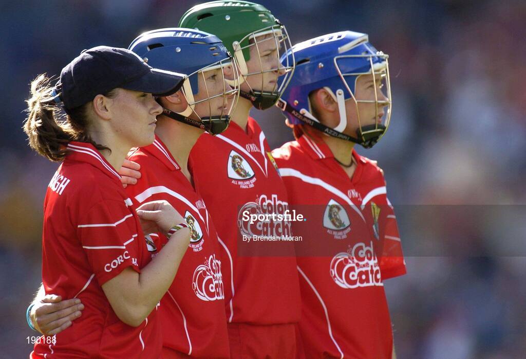 18 September 2005; Cork goalkeeper Aoife Murray, left, blesses herself before the game after standing with team-mates, from right, Rena Buckley, Amanda O'Regan and Rosarie Holland, for the national anthem. Tipperary v Cork, Foras na Gaeilge All-Ireland Senior Camogie Final, Croke Park, Dublin. Picture credit; Brendan Moran / SPORTSFILE