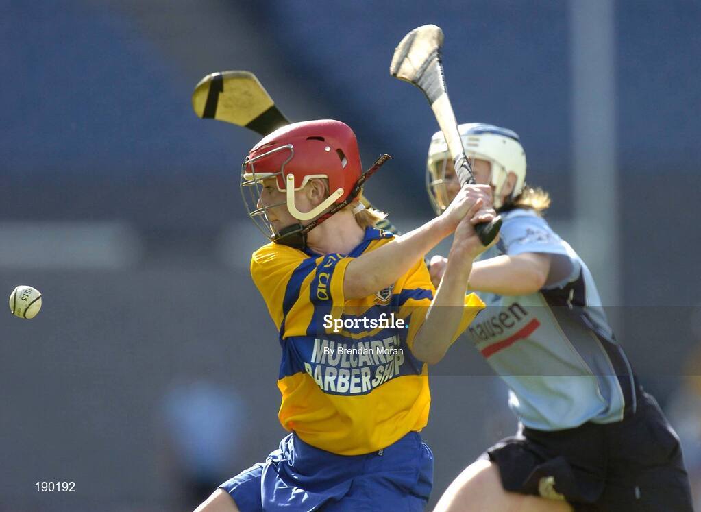 18 September 2005; Deirdre Murphy, Clare, in action against Aine Fanning, Dublin. Dublin v Clare, All-Ireland Junior Camogie Final, Croke Park, Dublin. Picture credit; Brendan Moran / SPORTSFILE *** Local Caption *** Any photograph taken by SPORTSFILE during, or in connection with, the 2005 Guinness All-Ireland Hurling Final which displays GAA logos or contains an image or part of an image of any GAA intellectual property, or, which contains images of a GAA player/players in their playing uniforms, may only be used for editorial and non-advertising purposes.  Use of photographs for advertising, as posters or for purchase separately is strictly prohibited unless prior written approval has been obtained from the Gaelic Athletic Association.