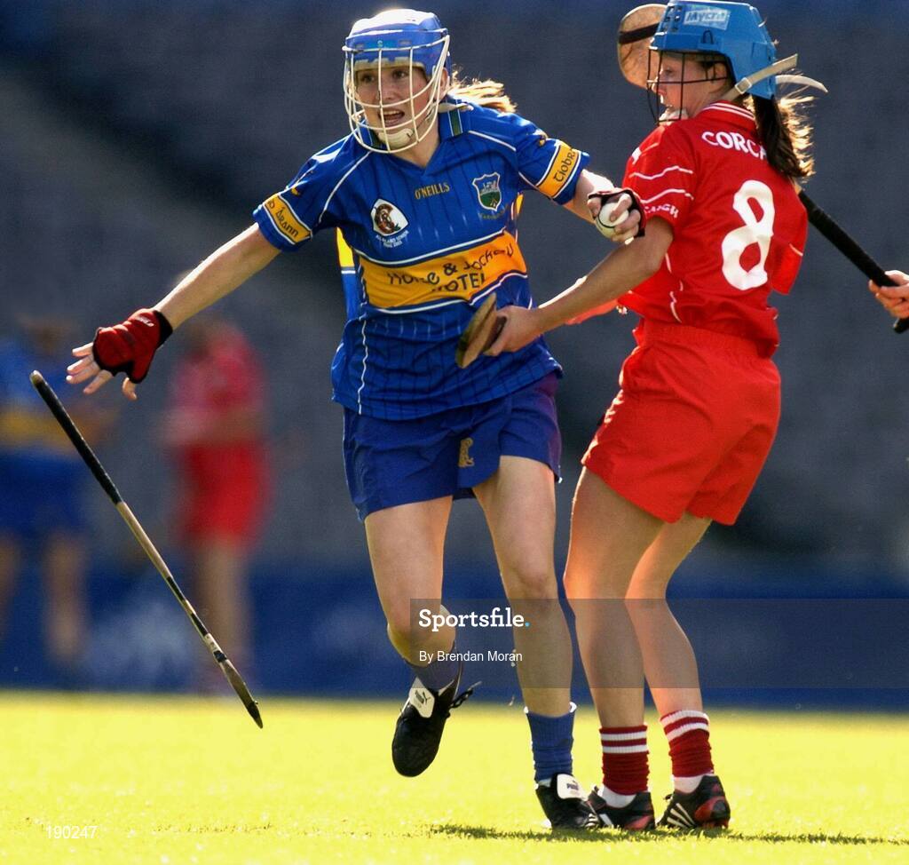 18 September 2005; Philly Fogarty, Tipperary, is tackled by Vivienne Harris, Cork. Tipperary v Cork, Foras na Gaeilge All-Ireland Senior Camogie Final, Croke Park, Dublin. Picture credit; Brendan Moran / SPORTSFILE