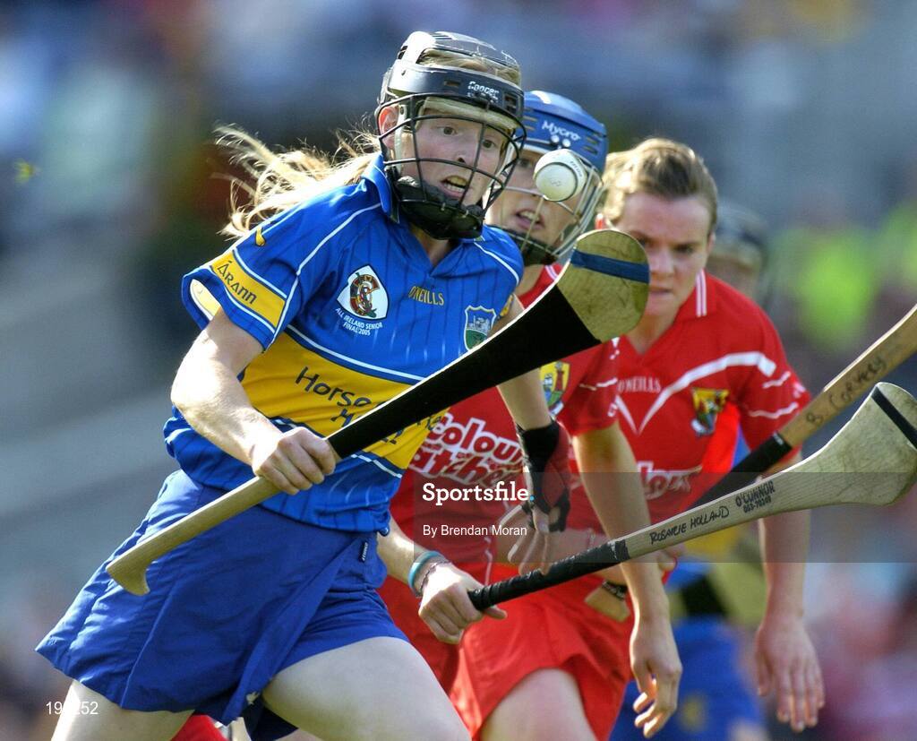 18 September 2005; Joanne Ryan, Tipperary, races clear of Rosarie Holland, Cork. Tipperary v Cork, Foras na Gaeilge All-Ireland Senior Camogie Final, Croke Park, Dublin. Picture credit; Brendan Moran / SPORTSFILE