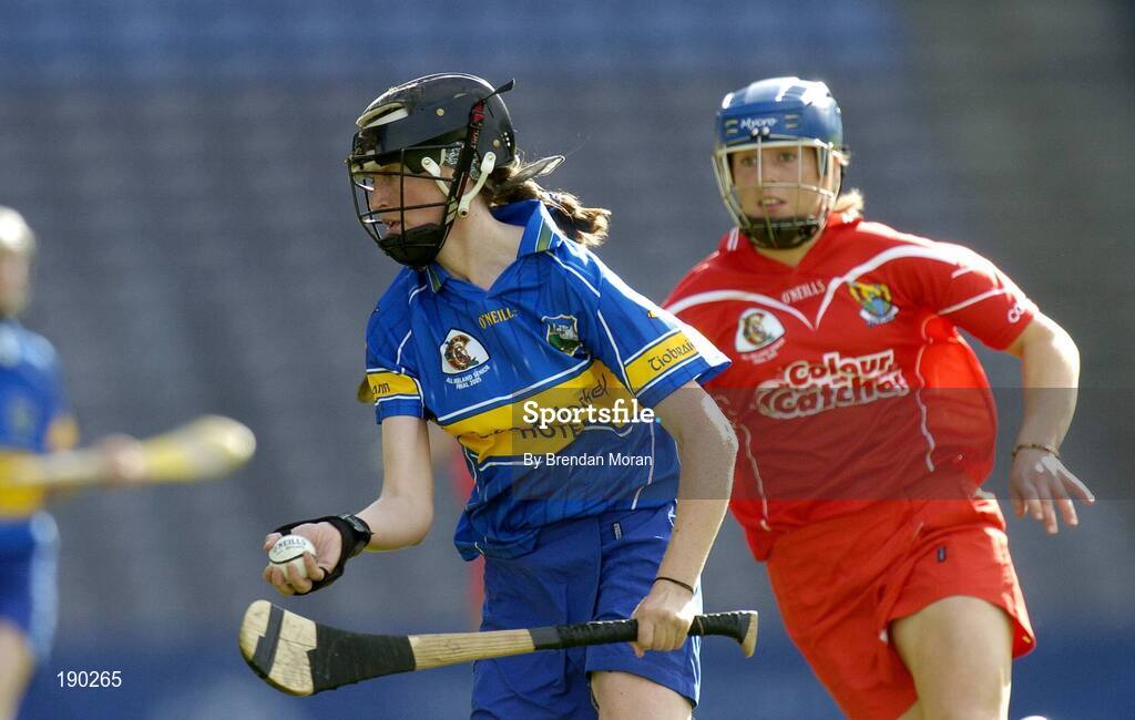18 September 2005; Suzanne Kelly, Tipperary, in action against Emer Dillon, Cork. Tipperary v Cork, Foras na Gaeilge All-Ireland Senior Camogie Final, Croke Park, Dublin. Picture credit; Brendan Moran / SPORTSFILE