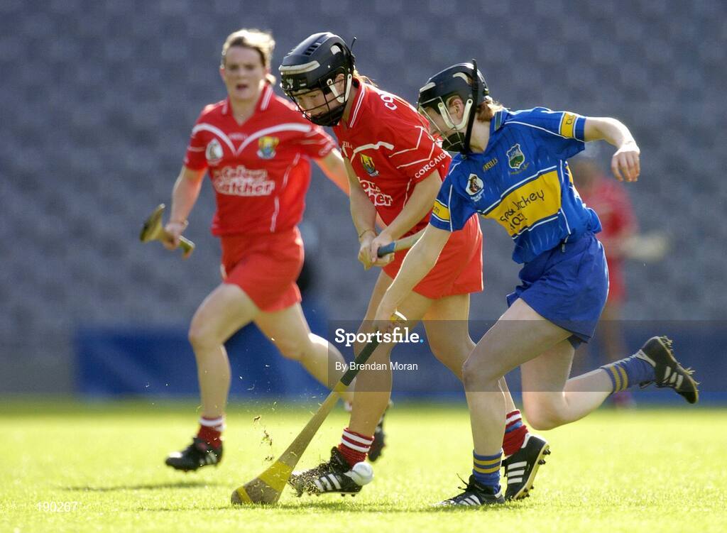 18 September 2005; Una O'Donoghue, Cork, is tackled by Therese Brophy, Tipperary. Tipperary v Cork, Foras na Gaeilge All-Ireland Senior Camogie Final, Croke Park, Dublin. Picture credit; Brendan Moran / SPORTSFILE