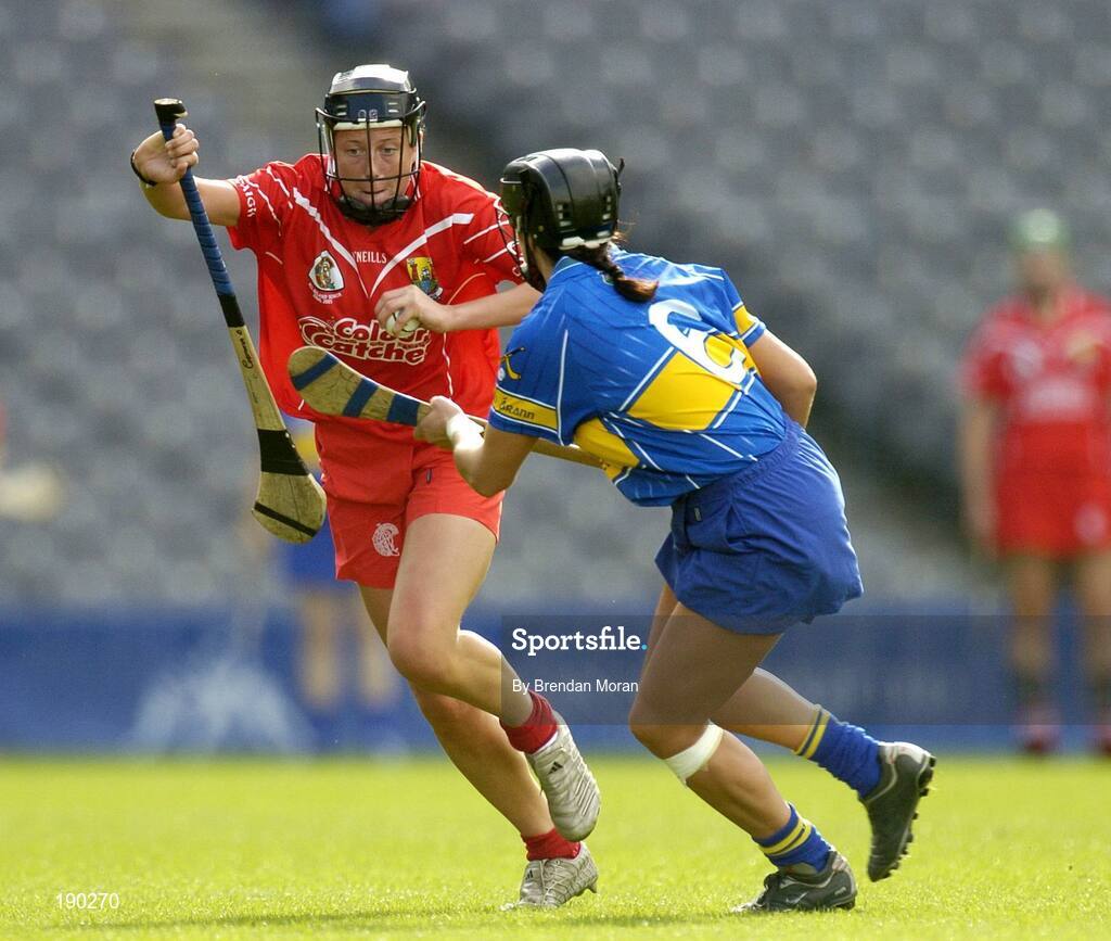 18 September 2005; Gemma O'Connor, Cork, is tackled by Ciara Gaynor, Tipperary. Tipperary v Cork, Foras na Gaeilge All-Ireland Senior Camogie Final, Croke Park, Dublin. Picture credit; Brendan Moran / SPORTSFILE