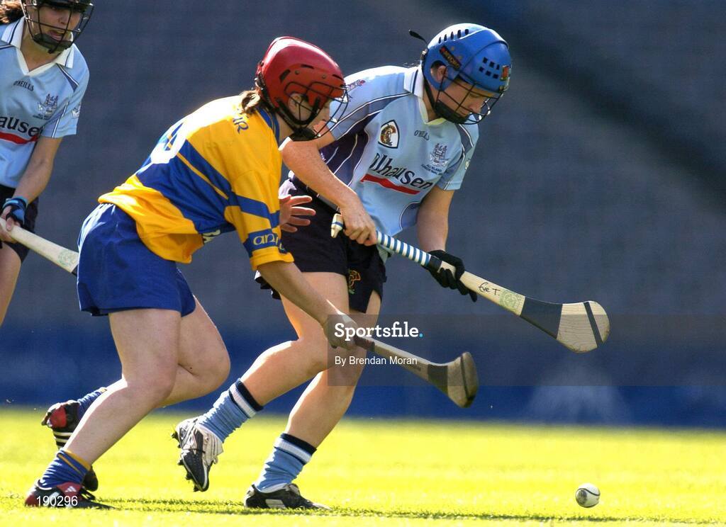 18 September 2005; Eve Talbot, Dublin, in action against Deirdre Corcoran, Clare. Dublin v Clare, All-Ireland Junior Camogie Final, Croke Park, Dublin. Picture credit; Brendan Moran / SPORTSFILE *** Local Caption *** Any photograph taken by SPORTSFILE during, or in connection with, the 2005 Guinness All-Ireland Hurling Final which displays GAA logos or contains an image or part of an image of any GAA intellectual property, or, which contains images of a GAA player/players in their playing uniforms, may only be used for editorial and non-advertising purposes.  Use of photographs for advertising, as posters or for purchase separately is strictly prohibited unless prior written approval has been obtained from the Gaelic Athletic Association.