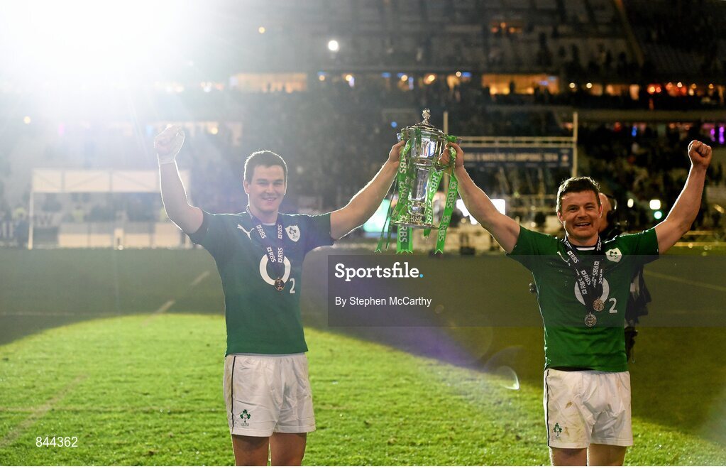 15 March 2014; Ireland's Jonathan Sexton, left, and Brian O'Driscoll celebrates with the trophy following their side's victory. RBS Six Nations Rugby Championship 2014, France v Ireland. Stade De France, Saint Denis, Paris, France. Picture credit: Stephen McCarthy / SPORTSFILE
