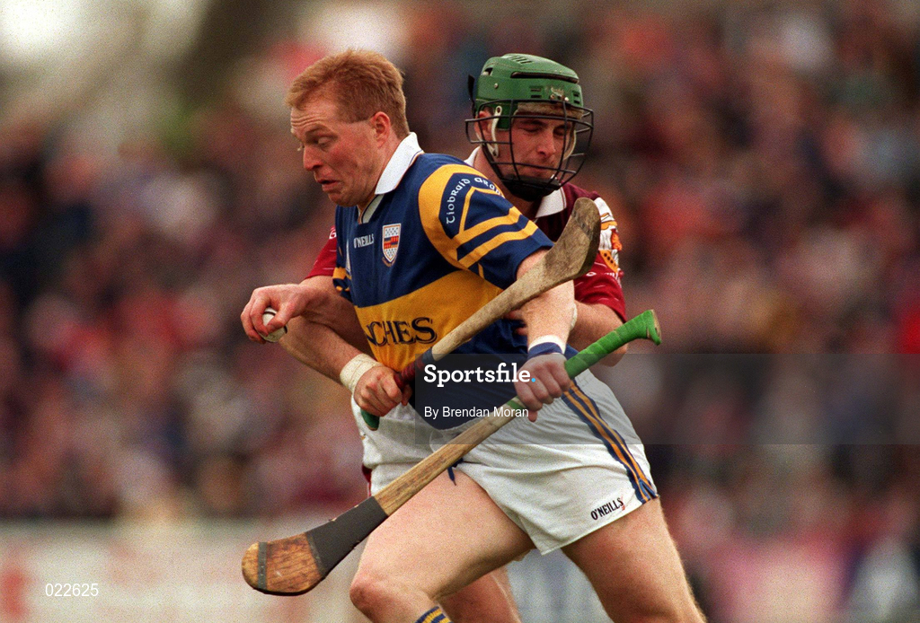16 May 1999; Declan Ryan of Tipperary in action against Fergus Flynn of Galway during the Church & General National Hurling League Division 1 Final match between Galway and Tipperary at Cusack Park in Ennis, Clare. Photo By Brendan Moran/Sportsfile