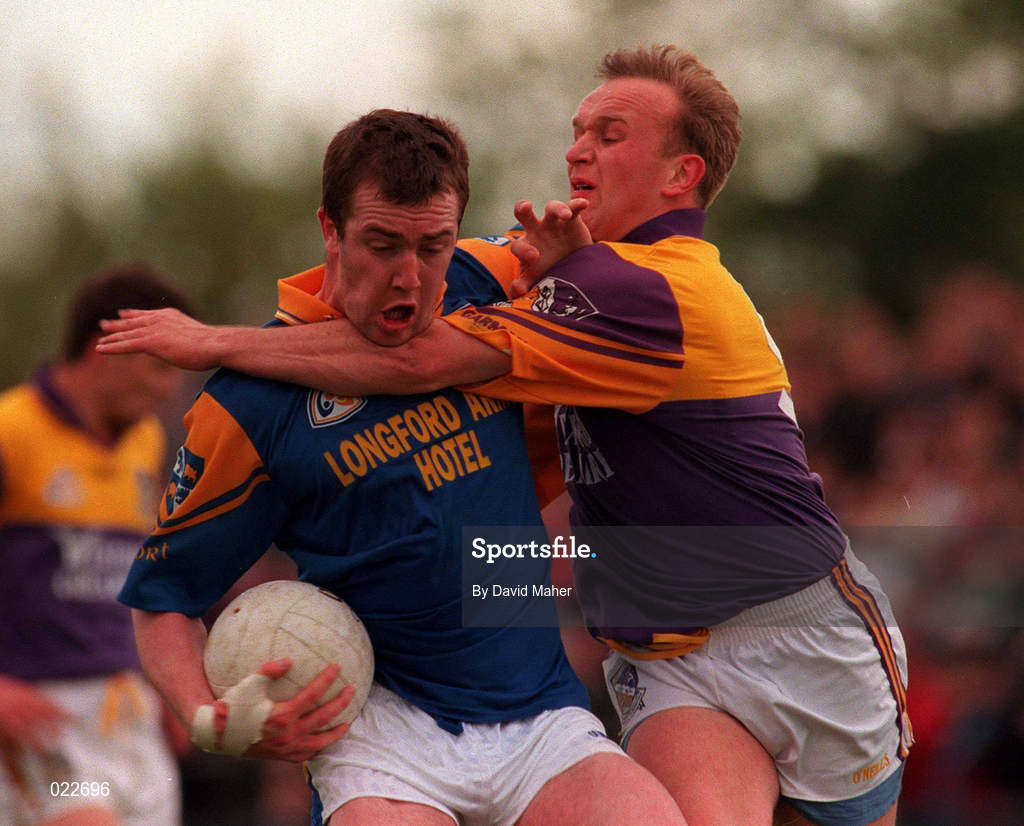 16 May 1999; Enda Barden of Longford in action against Colin Sunderland of Wexford during the Bank of Ireland Leinster Senior Football Championship Preliminary Round Replay match between Longford and Wexford at Pearse Park in Longford. Photo by David Maher/Sportsfile
