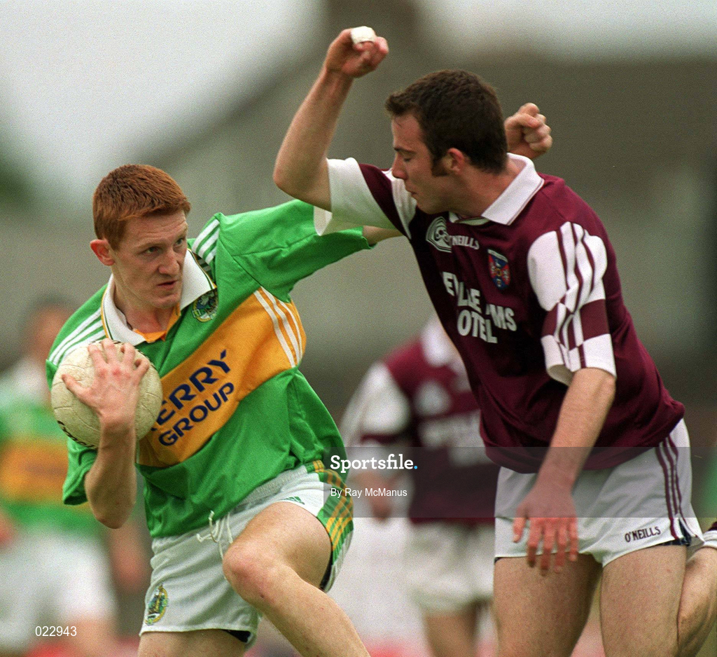 15 May 1999; Noel Kennelly of Kerry in action against James Galvin of Westmeath during the All-Ireland U21 Football Championship Final match at the Gaelic Grounds in Limerick. Photo by Ray McManus/Sportsfile
