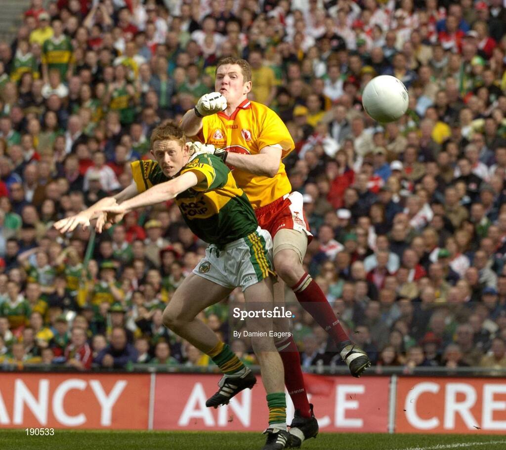 25 September 2005;Tyrone goalkeeper Pascal McConnell in action against Colm Cooper, Kerry, Bank of Ireland All-Ireland Senior Football Championship Final, Kerry v Tyrone, Croke Park, Dublin. Picture credit; Damien Eagers/ SPORTSFILE *** Local Caption *** Any photograph taken by SPORTSFILE during, or in connection with, the 2005 Bank of Ireland All-Ireland Senior Football Final which displays GAA logos or contains an image or part of an image of any GAA intellectual property, or, which contains images of a GAA player/players in their playing uniforms, may only be used for editorial and non-advertising purposes.  Use of photographs for advertising, as posters or for purchase separately is strictly prohibited unless prior written approval has been obtained from the Gaelic Athletic Association.