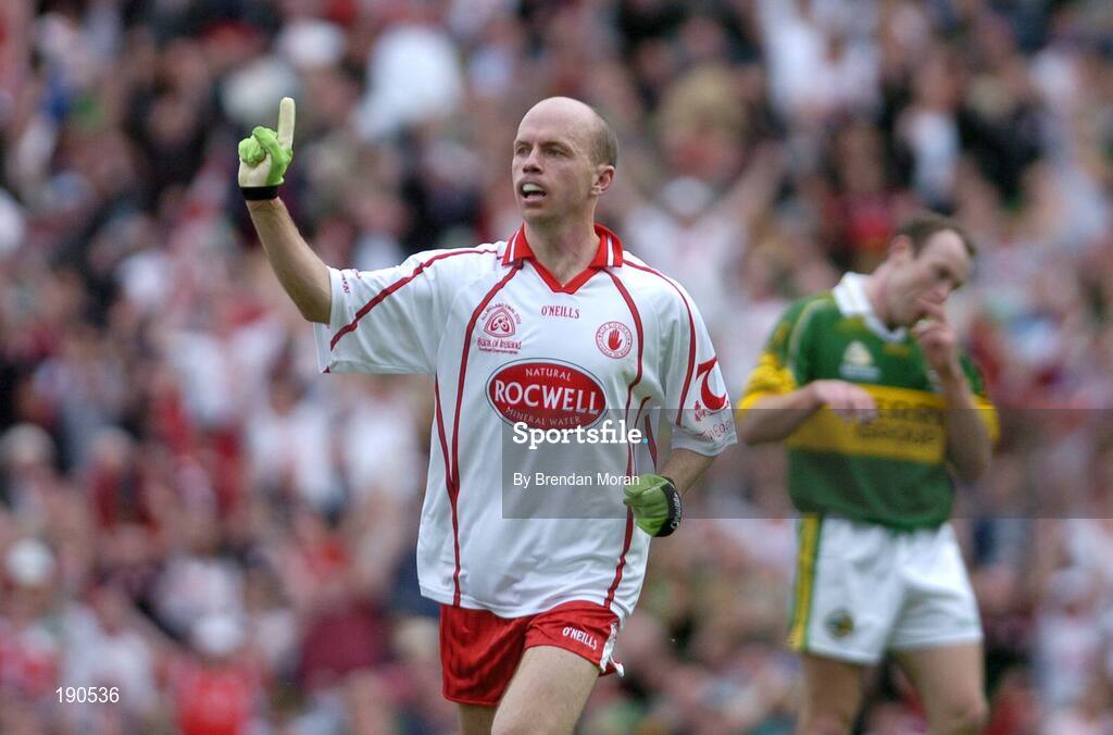 25 September 2005; Peter Canavan, Tyrone, celebrates scoring his side's first goal. Bank of Ireland All-Ireland Senior Football Championship Final, Kerry v Tyrone, Croke Park, Dublin. Picture credit; Brendan Moran / SPORTSFILE *** Local Caption *** Any photograph taken by SPORTSFILE during, or in connection with, the 2005 Bank of Ireland All-Ireland Senior Football Final which displays GAA logos or contains an image or part of an image of any GAA intellectual property, or, which contains images of a GAA player/players in their playing uniforms, may only be used for editorial and non-advertising purposes.  Use of photographs for advertising, as posters or for purchase separately is strictly prohibited unless prior written approval has been obtained from the Gaelic Athletic Association.
