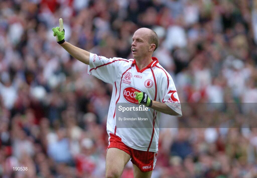 25 September 2005; Peter Canavan, Tyrone, celebrates scoring his sides first goal. Bank of Ireland All-Ireland Senior Football Championship Final, Kerry v Tyrone, Croke Park, Dublin. Picture credit; Brendan Moran / SPORTSFILE *** Local Caption *** Any photograph taken by SPORTSFILE during, or in connection with, the 2005 Bank of Ireland All-Ireland Senior Football Final which displays GAA logos or contains an image or part of an image of any GAA intellectual property, or, which contains images of a GAA player/players in their playing uniforms, may only be used for editorial and non-advertising purposes.  Use of photographs for advertising, as posters or for purchase separately is strictly prohibited unless prior written approval has been obtained from the Gaelic Athletic Association.