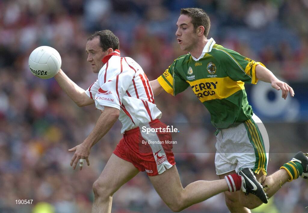 25 September 2005; Brian Dooher, Tyrone, in action against Declan O'Sullivan, Kerry. Bank of Ireland All-Ireland Senior Football Championship Final, Kerry v Tyrone, Croke Park, Dublin. Picture credit; Brendan Moran / SPORTSFILE *** Local Caption *** Any photograph taken by SPORTSFILE during, or in connection with, the 2005 Bank of Ireland All-Ireland Senior Football Final which displays GAA logos or contains an image or part of an image of any GAA intellectual property, or, which contains images of a GAA player/players in their playing uniforms, may only be used for editorial and non-advertising purposes.  Use of photographs for advertising, as posters or for purchase separately is strictly prohibited unless prior written approval has been obtained from the Gaelic Athletic Association.