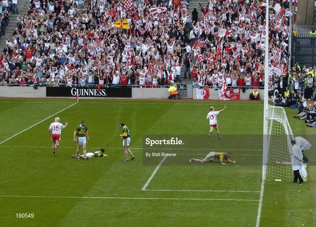 25 September 2005; Tyrone's Peter Canavan, 13, celebrates his side's first goal. Bank of Ireland All-Ireland Senior Football Championship Final, Kerry v Tyrone, Croke Park, Dublin. Picture credit; Matt Browne / SPORTSFILE *** Local Caption *** Any photograph taken by SPORTSFILE during, or in connection with, the 2005 Bank of Ireland All-Ireland Senior Football Final which displays GAA logos or contains an image or part of an image of any GAA intellectual property, or, which contains images of a GAA player/players in their playing uniforms, may only be used for editorial and non-advertising purposes.  Use of photographs for advertising, as posters or for purchase separately is strictly prohibited unless prior written approval has been obtained from the Gaelic Athletic Association.