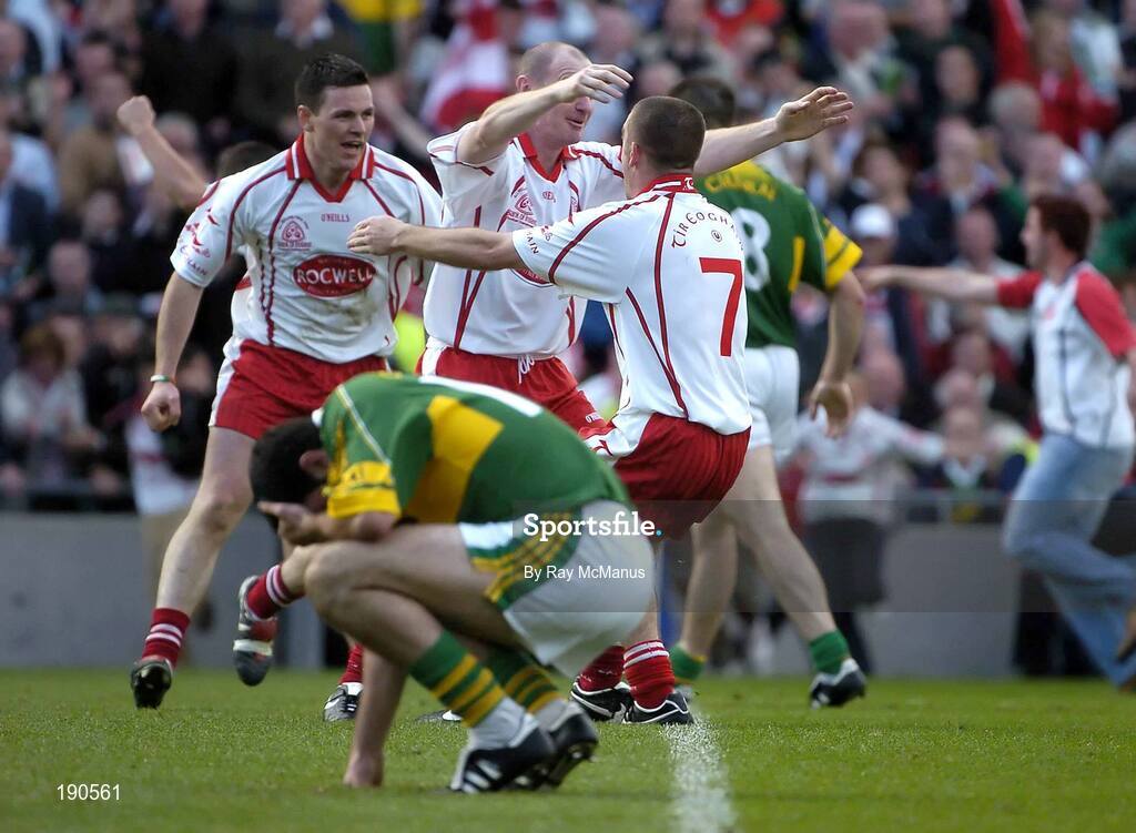25 September 2005;Tyrone players Chris Lawn, centre, Philip Jordan, 7,and Conor Gormley celebrate victory over Kerry . Bank of Ireland All-Ireland Senior Football Championship Final, Kerry v Tyrone, Croke Park, Dublin. Picture credit; Ray McManus / SPORTSFILE *** Local Caption *** Any photograph taken by SPORTSFILE during, or in connection with, the 2005 Bank of Ireland All-Ireland Senior Football Final which displays GAA logos or contains an image or part of an image of any GAA intellectual property, or, which contains images of a GAA player/players in their playing uniforms, may only be used for editorial and non-advertising purposes.  Use of photographs for advertising, as posters or for purchase separately is strictly prohibited unless prior written approval has been obtained from the Gaelic Athletic Association.